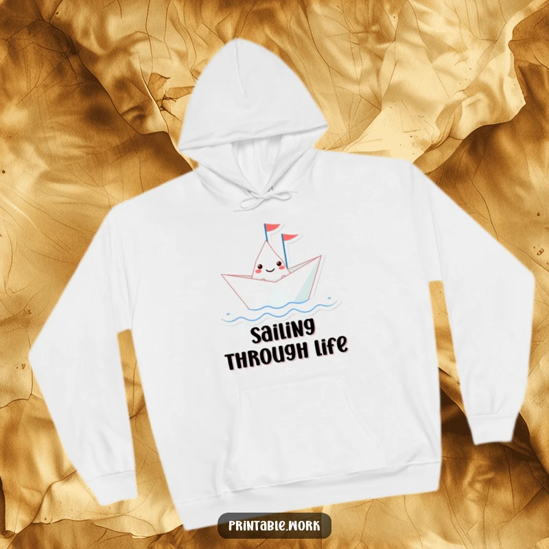 Funny paper boat character with a tiny flag sailing on a wavy line, featured on a warm hoodie, perfect for cozy adventures.
