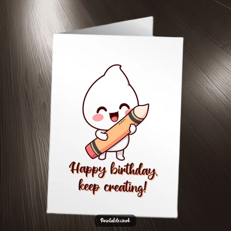 Funny Free Printable Birthday Card: A joyful Kawaii creature draws a funny wiggly line with a giant crayon, sending birthday cheer.