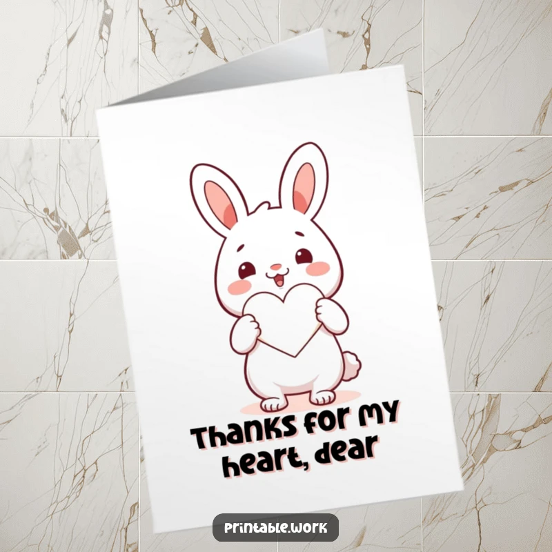 Funny Free Printable Thank You Card: A happy kawaii rabbit excitedly cuts a perfect heart shape from paper, expressing heartfelt thanks.